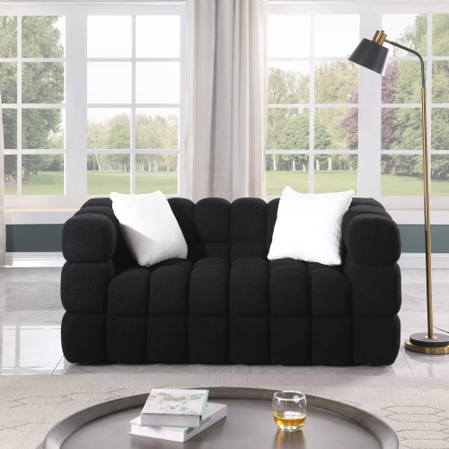 Modern black premium sofa set with white cushions, ideal for cozy living spaces. perfect for relaxation and entertainment.